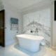Bathroom interior design with marble floor and walls. Luxury Interior Design.